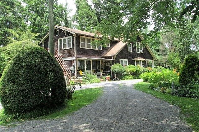 Exterior with view of apartment entrance (stairs to the left