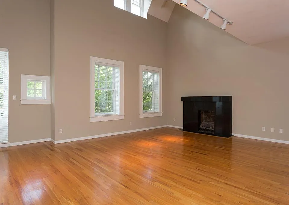 Open Living Room w/ Fireplace and Vaulted Ceilings.

*Fireplace has been upgraded to remote-controlled, direct vent gas fireplace