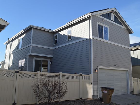 2 car garage, garage is on the back side