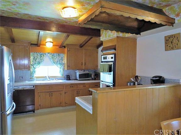 A spacious kitchen with a warm and cozy feel.
