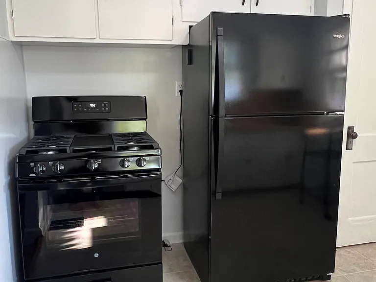Brand new appliances - GE 30" Gas Range and Whirlpool 20 cu. ft. Refrigerator