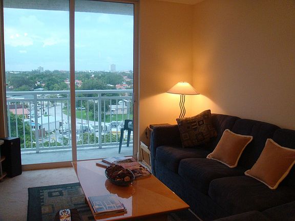 Living room has balcony facing Coral Way.