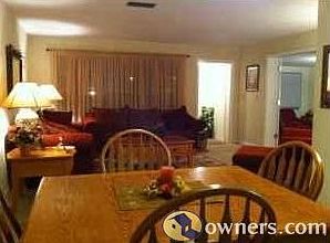Dining area looking into living room