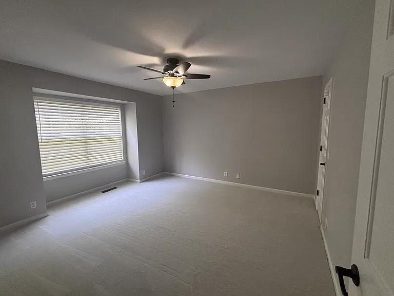 Primary Downstairs bedroom with full bath