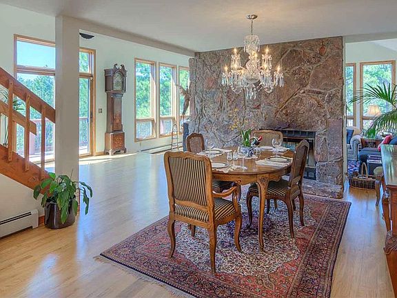 Dining Room with fireplace for gracious entertaining and family dinners.