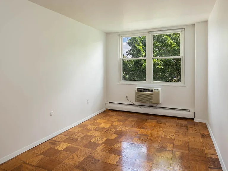 Bedroom with Parquet Flooring