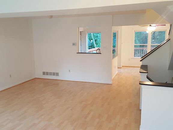 Spacious living room with prep window to kitchen