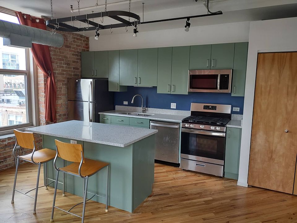 Updated kitchen, granite counter tops, painted cabinets, and stainless steel appliances.