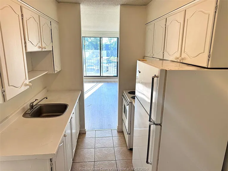 2565 Lauzon Rd #211 — Photo 7