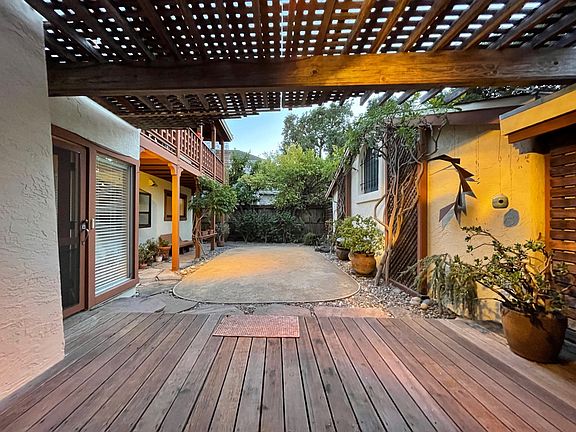 Backyard w/ Deck & trellis