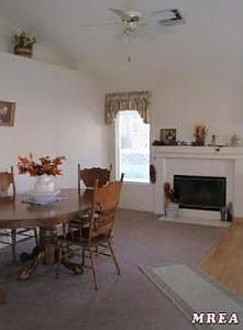 The Dining Area with Fireplace