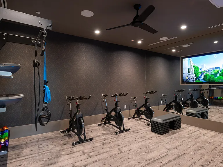 Stay active in our modern spin and fitness studio, fully equipped for your workout routine.