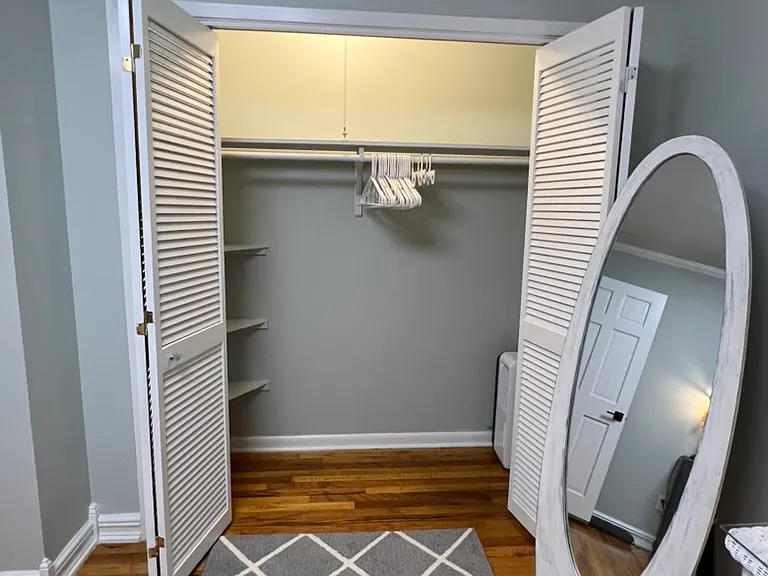 Large double closet. Shelves on left. Hangars provided. Full length mirror. All linen/pillows/blankets for bed provided.