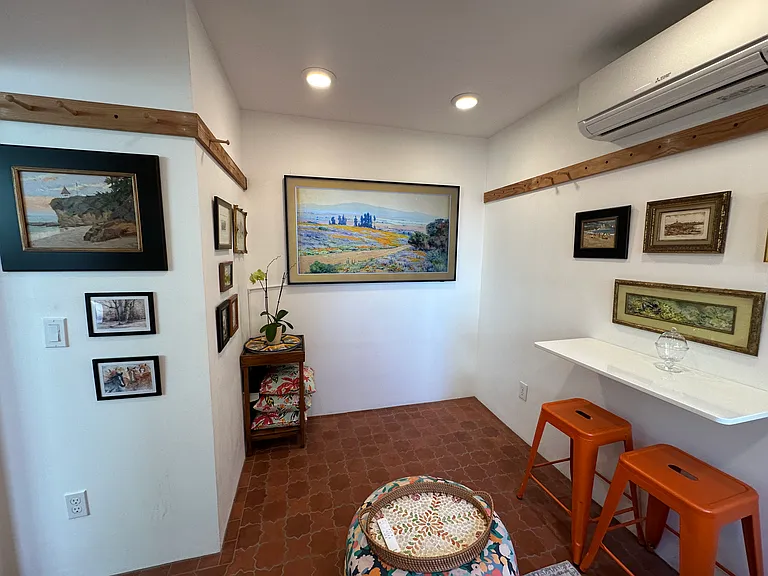 65" Samsung The Frame TV adds a vast choice of paintings to display in a gallery of small works by known artists