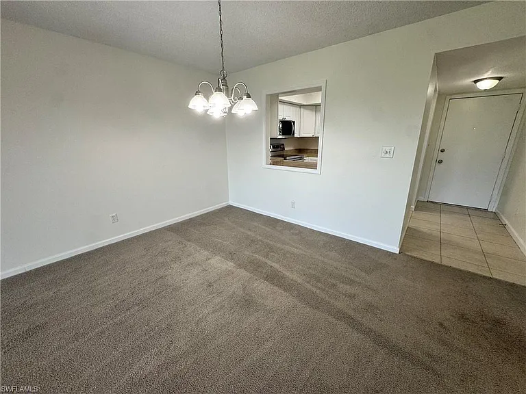 5667 Rattlesnake Hamm Rd N #B-301 — Photo 4