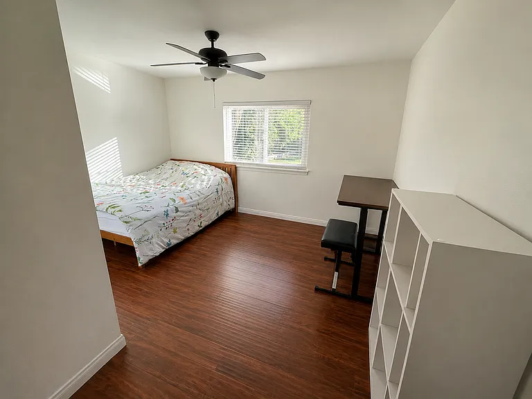 Bed room 2 with backyard view and closet