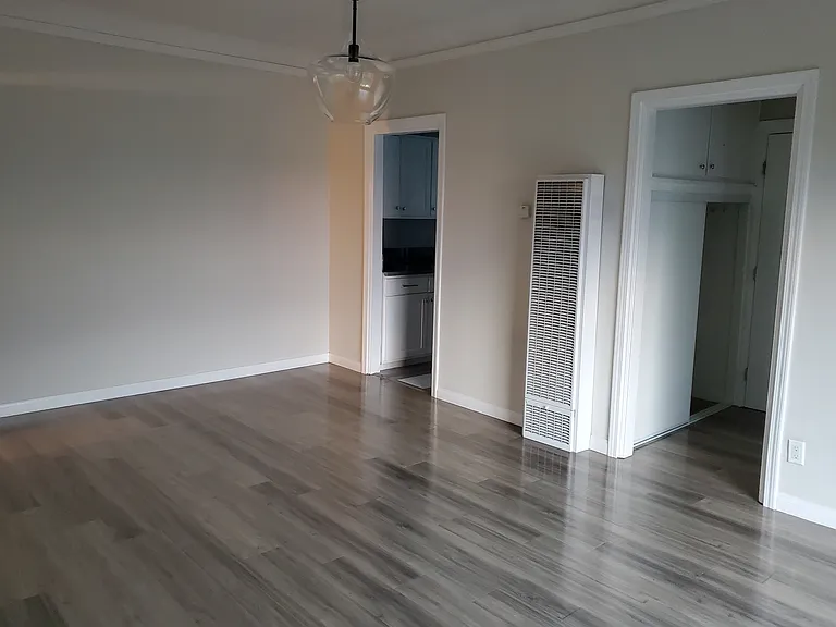 Views of kitchen and hallway
