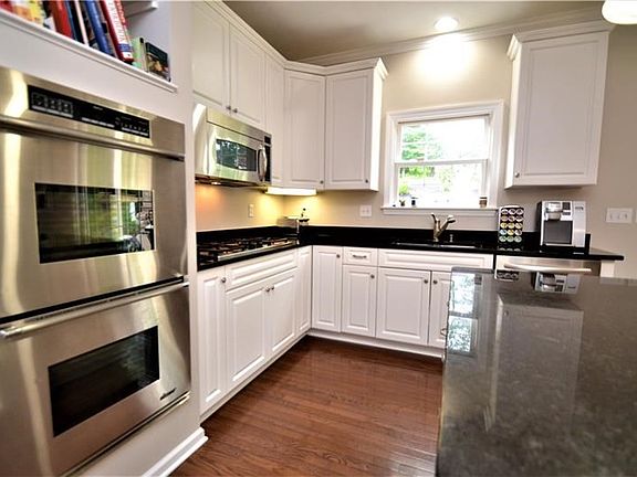 Kitchen with double ovens and cooktop.