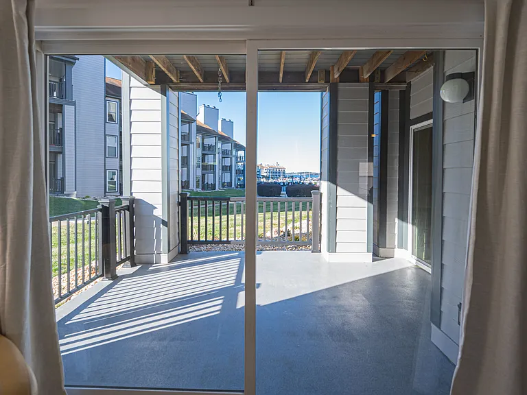 Patio with, views and walkout access to pool, docks, etc.