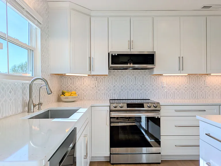 Kitchen: Featuring a brand new induction stove and convection oven.