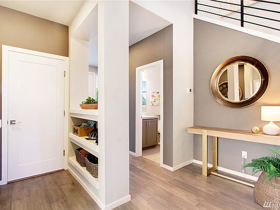 Owner's entry from garage  into mud room area.  Photos of another 2273 at another Harbour Homes community. Details and color selections will vary.