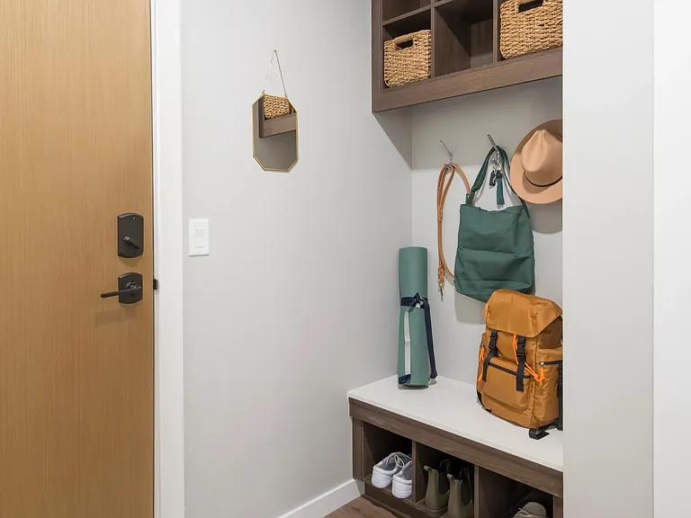 Built-in mudrooms with cubbies, and key drop.