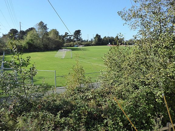 View of soccer field from private balcony.