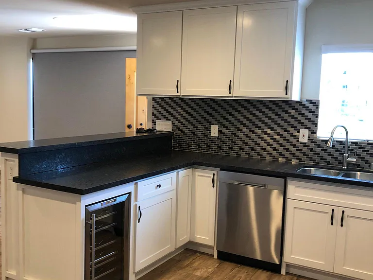 Kitchen with raised bar area - great for guest seating.