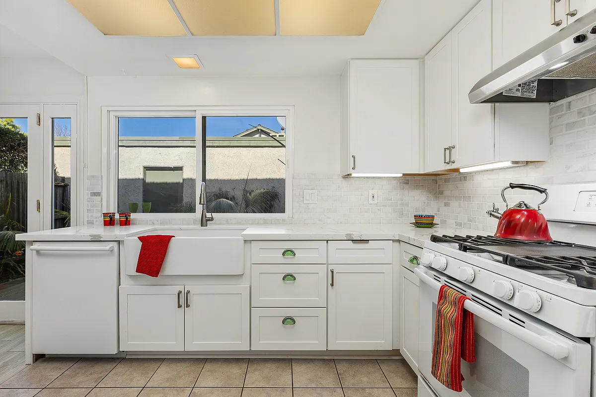 Quartz counter-tops, farm style sink, subway tile backsplash - 2783 Caminito San Marino