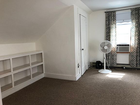 Living room/dining office area with deep closet