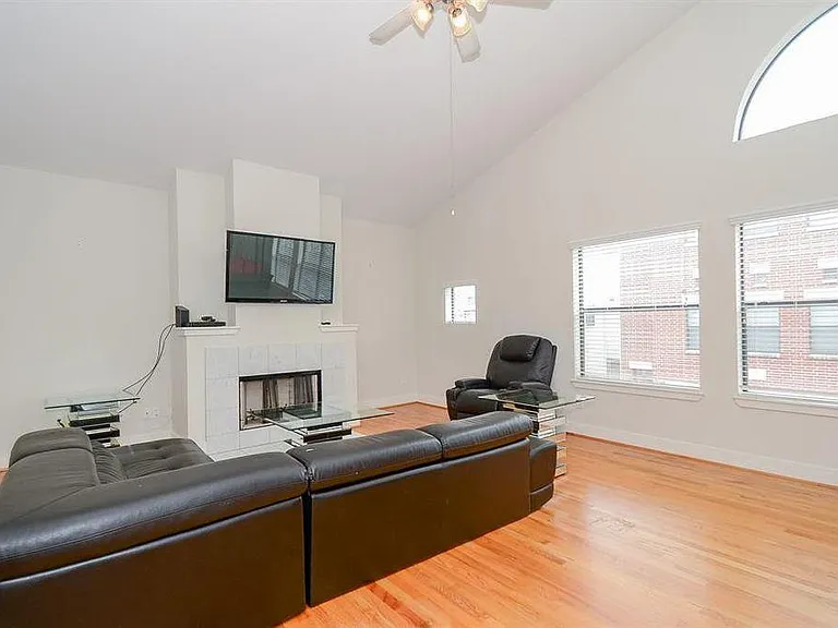 Living room area with large windows to provide plenty of natural light