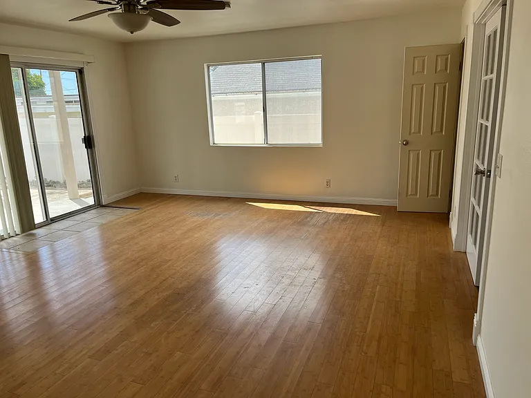Downstairs den or living room (note: Floor has been refinished and is now cleaner and lighter)