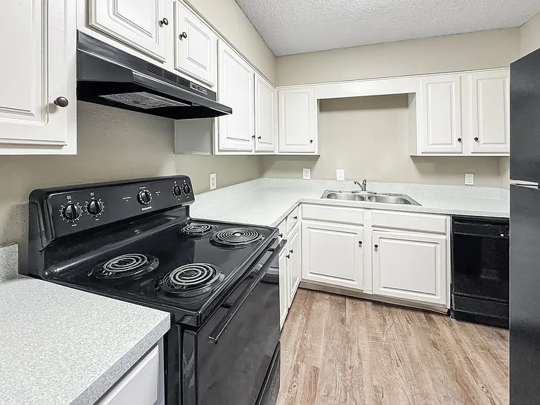 Bright kitchen space combining modern convenience with classic style.