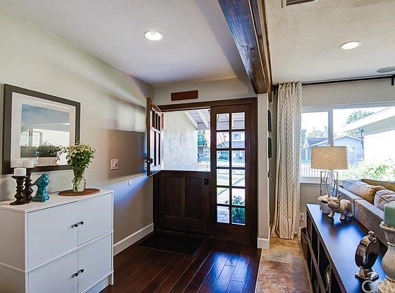 Adorable brand new custom walnut Dutch door with sidelight.