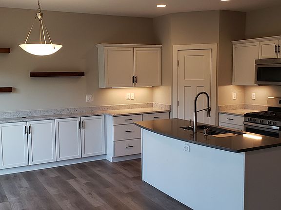 New white shaker cabinets.