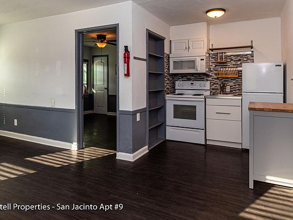 Kitchen: full sized refrigerator, stove/oven with microwave above. Cabinet and storage. Extra chef's cabinet.