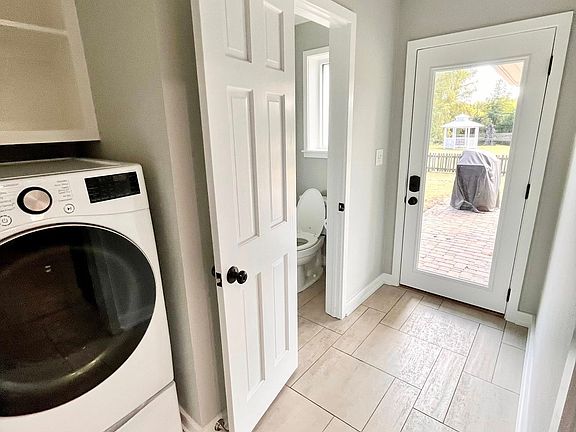 laundry area and half bath