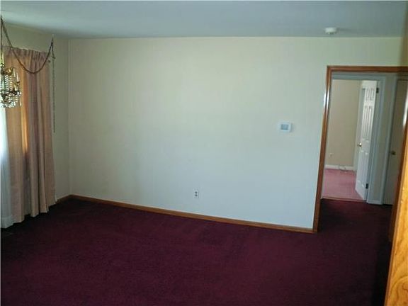 Formal living room opens to dining room