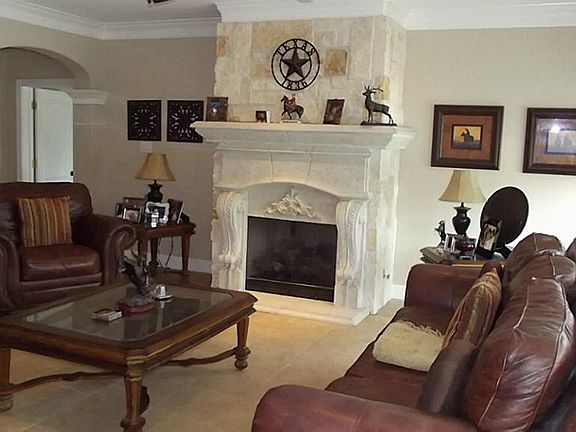Family room open to the kitchen plus great view of the swimming pool