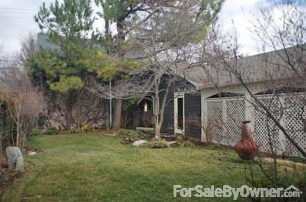 Garden with side entrance to garage apt.