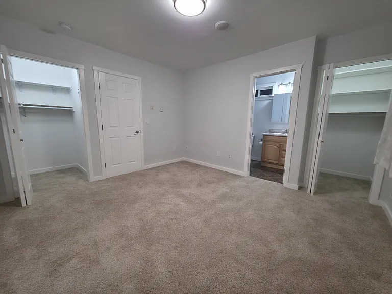 Secondary Bedroom with closets