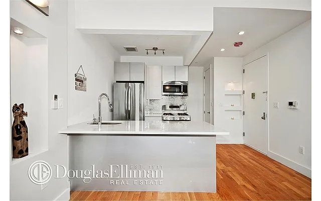 Sold by Douglas Elliman | media 17