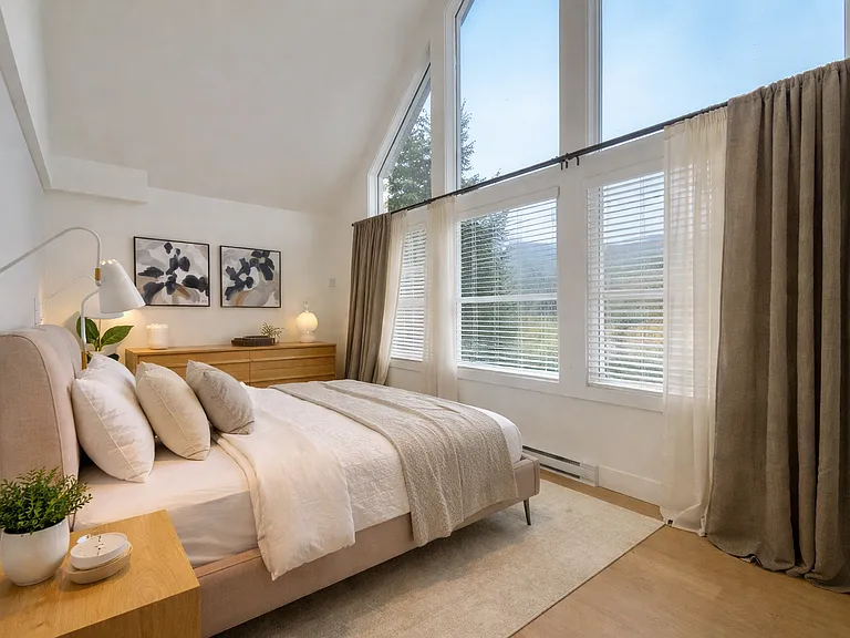Mountain view bedroom with serene decor_03202026