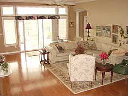 living room with golf course view