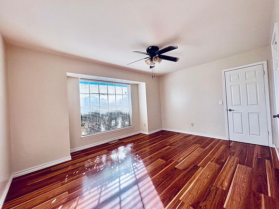 Beautiful, spacious first master bedroom with huge window