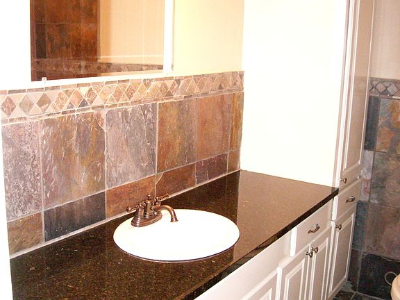 Bathroom with granite countertop