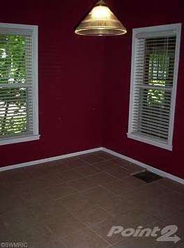 Newer Ceramic tile in Kitchen, Formal Dining and Bath.