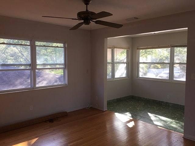 living room looking into bonus room/porch