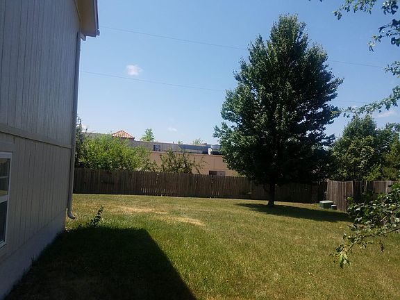 Yard with Trees to the right of the house