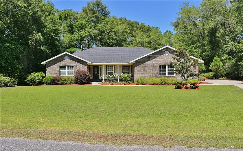 1st image of 302 SW Timberland Ct